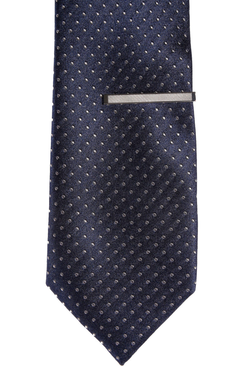 A tie-clip slim shiny metal finish and rhodium