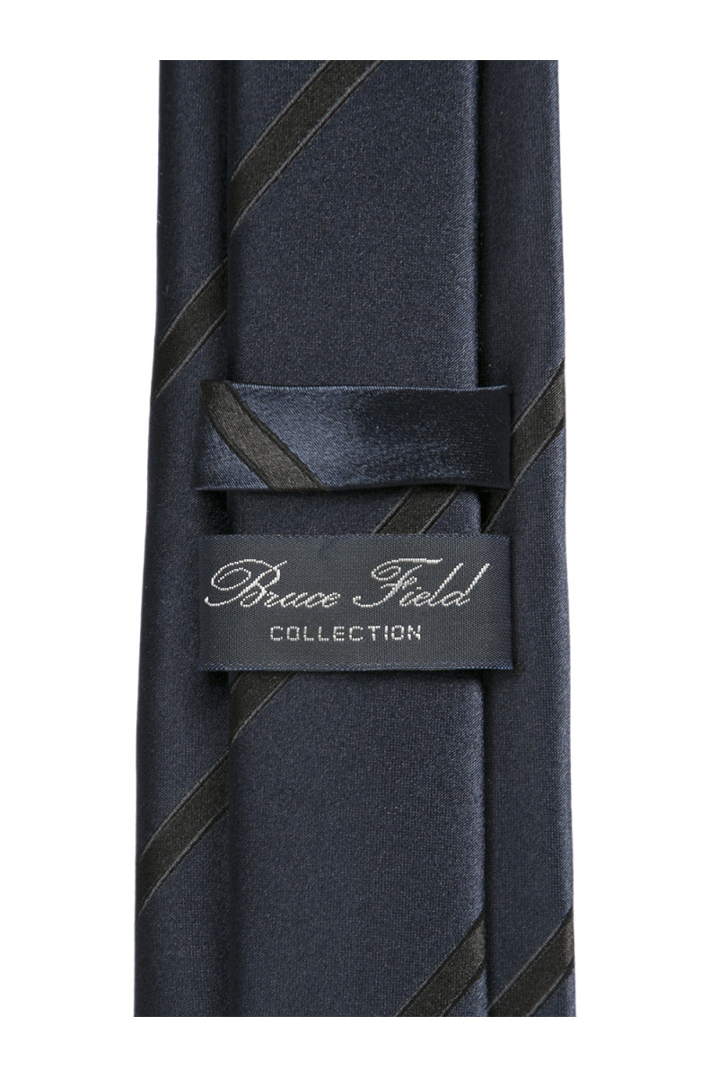 Cravate en pure soie piquée bleu marine et puces ciel